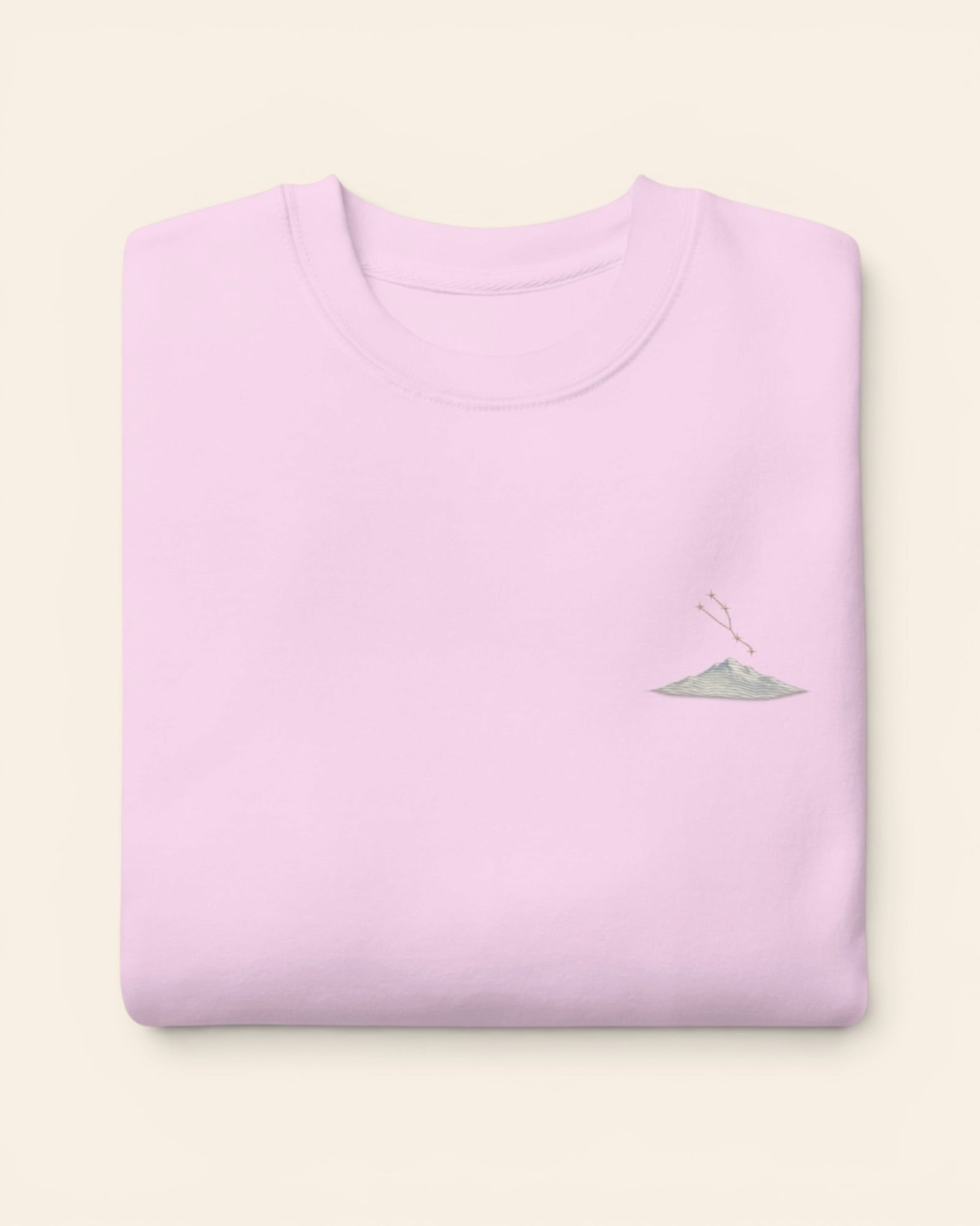 Taurus constellation crewneck sweatshirt with embroidered stars above a mountain ridge, in Lavender