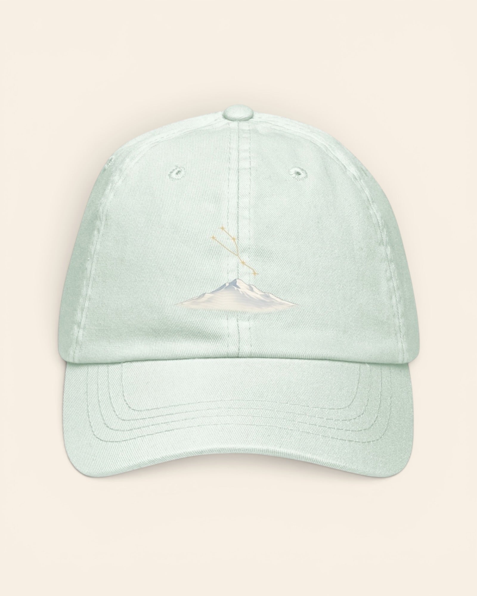 Taurus constellation hat with embroidered stars above a mountain ridge, in Pastel Mint