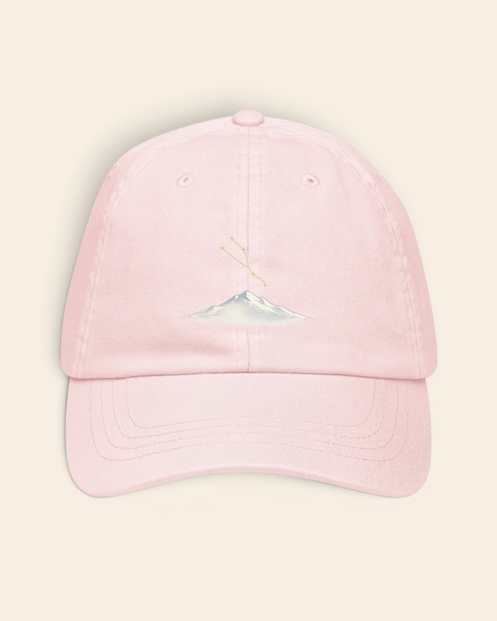 Taurus constellation hat with embroidered stars above a mountain ridge, in Pastel Pink