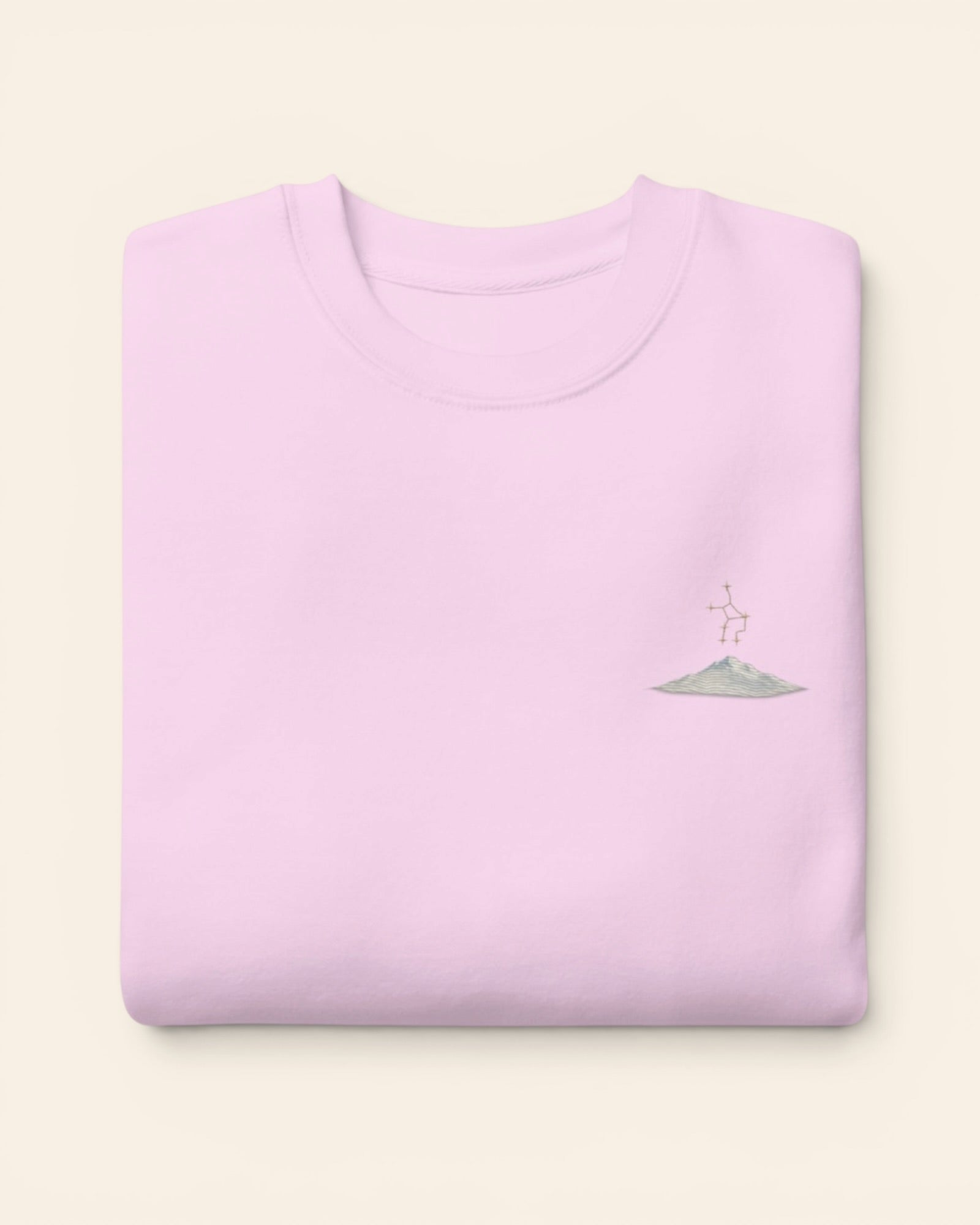 Virgo constellation crewneck sweatshirt with embroidered stars above a mountain ridge, in Lavender
