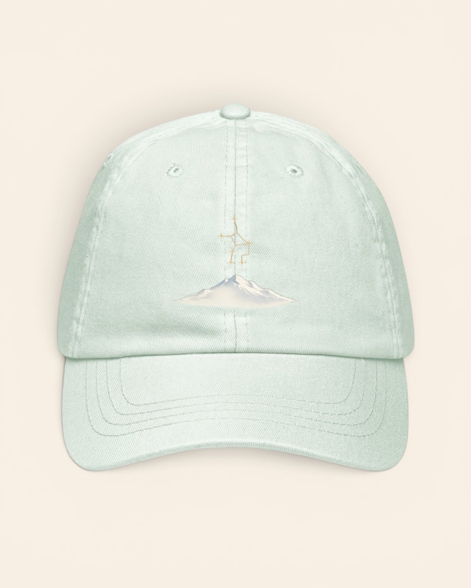 Virgo constellation hat with embroidered stars above a mountain ridge, in Pastel Mint