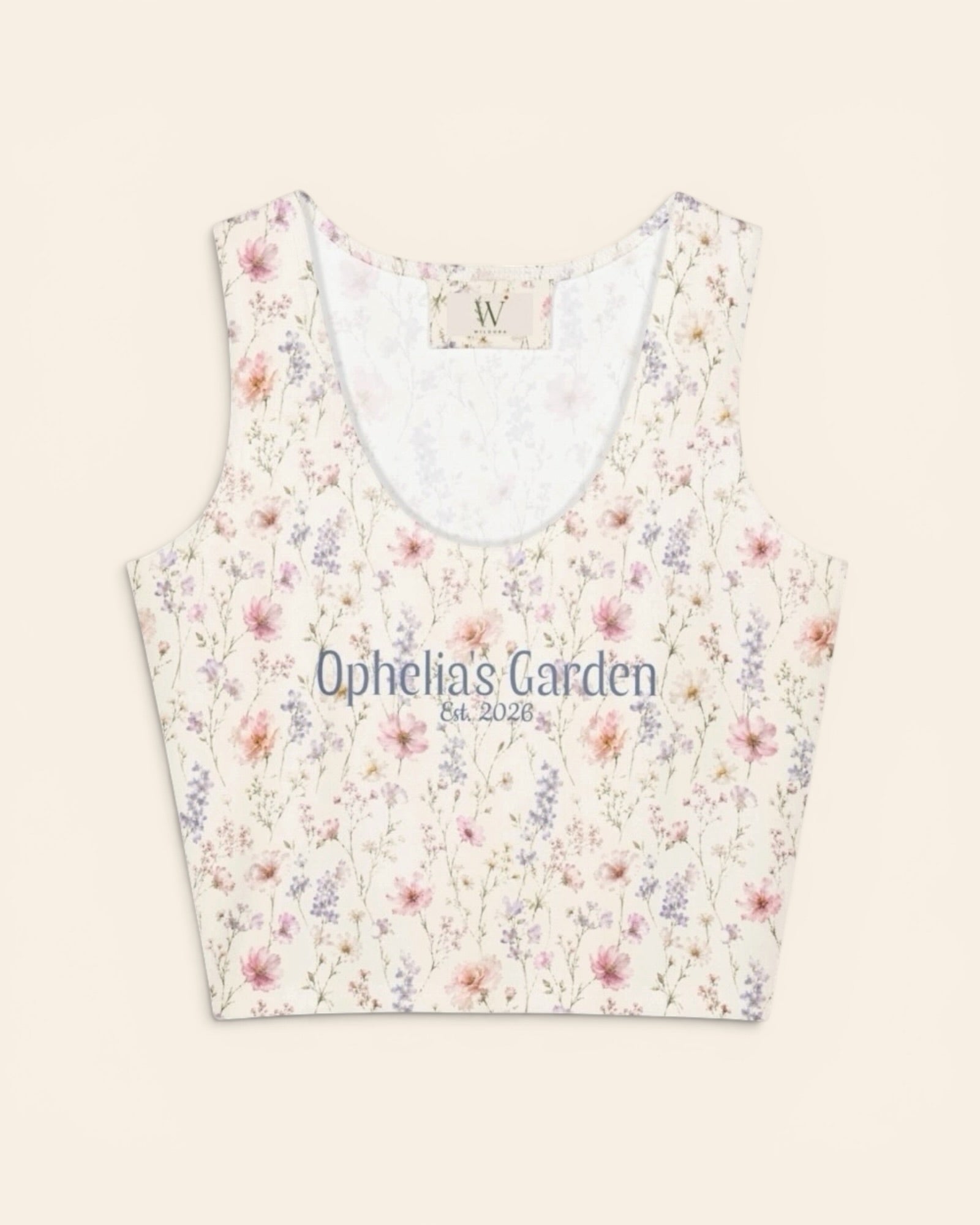 The Wildflower Theory Crop Top, with blush cosmos, cottage roses, larkspur, and baby's breath print